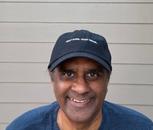 HELP EVER. HURT NEVER. — Embroidered Dad Cap