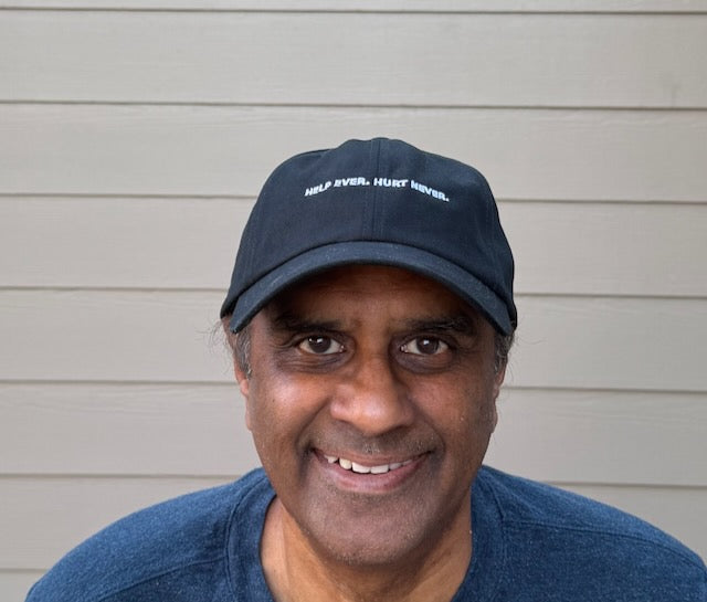 HELP EVER. HURT NEVER. — Embroidered Dad Cap